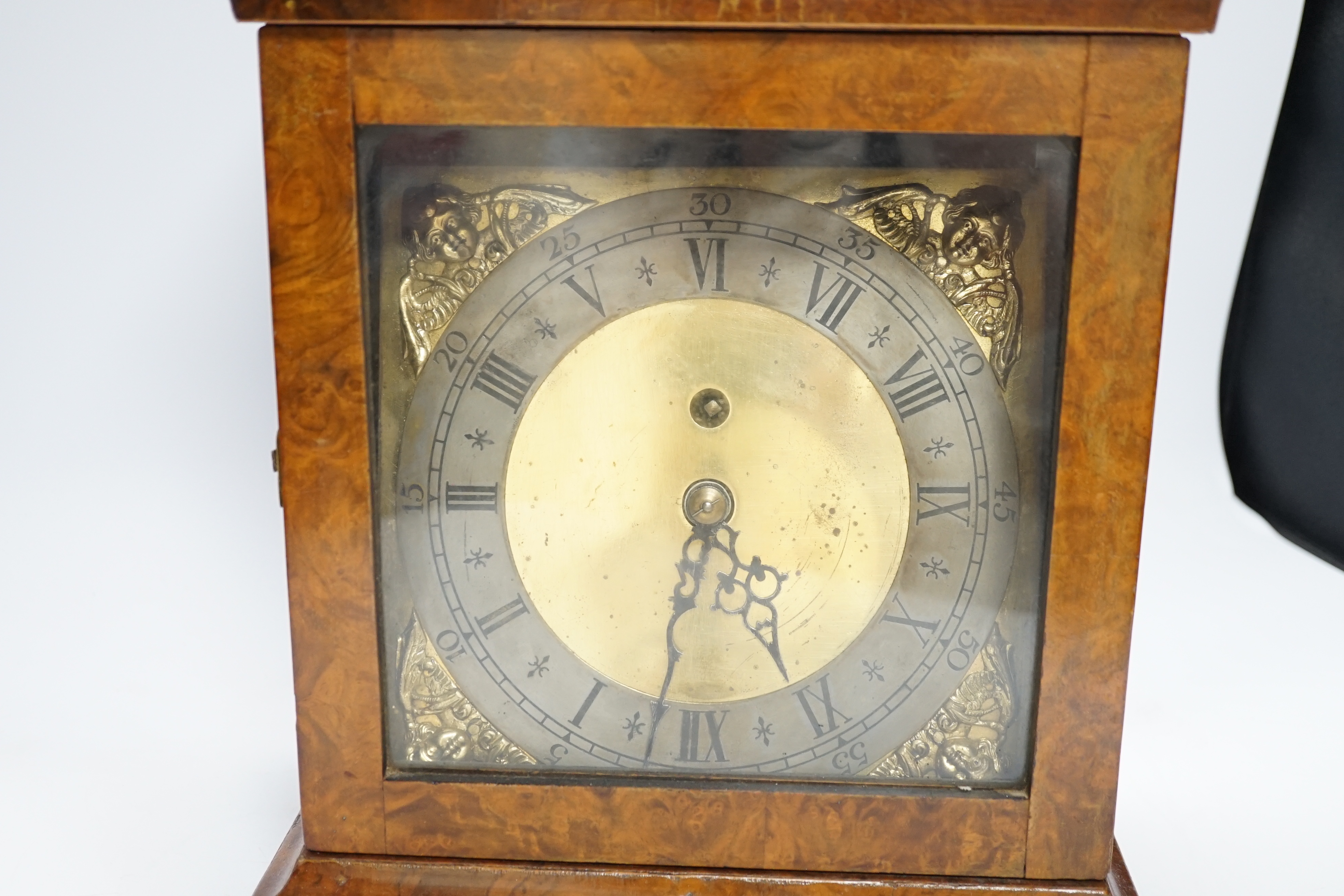 A walnut cased mantel timepiece with silvered dial, 37.5cm high